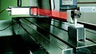 Laser system aligned for CNC machine leveling